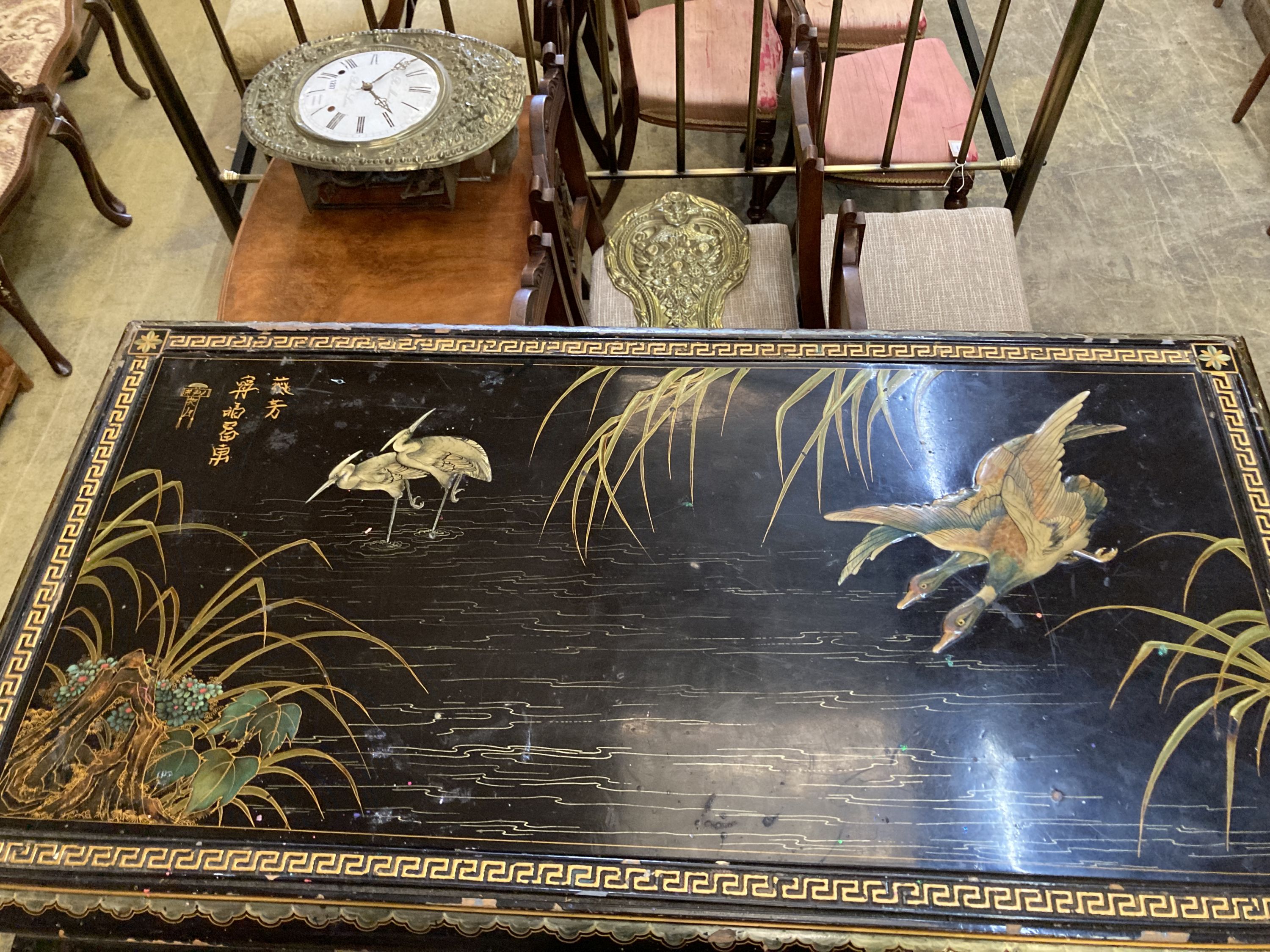 A rectangular Chinese lacquer coffee table, length 128cm, depth 69cm, height 44cm